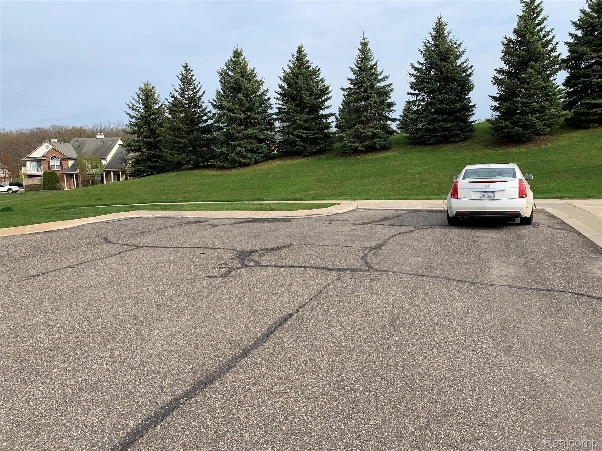 3593 Tremonte Circle, Unit 317 Rochester, MI 48306 - Photo 28 of 28 Extra Parking Space