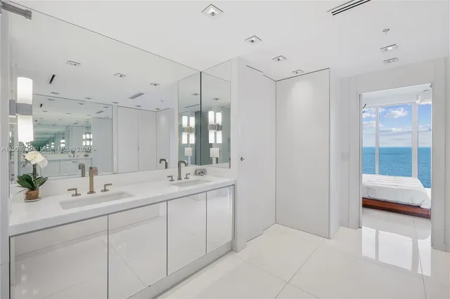 a view of a hallway with washer and dryer