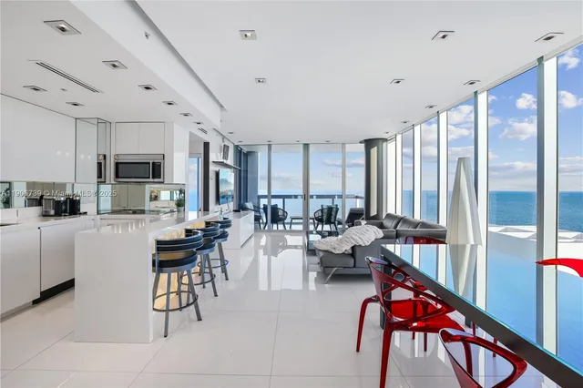 a kitchen with sink cabinets and outdoor seating