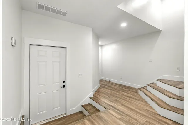 a view of swimming pool with a balcony