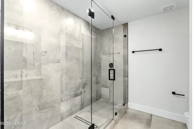 an aerial view of beach and city