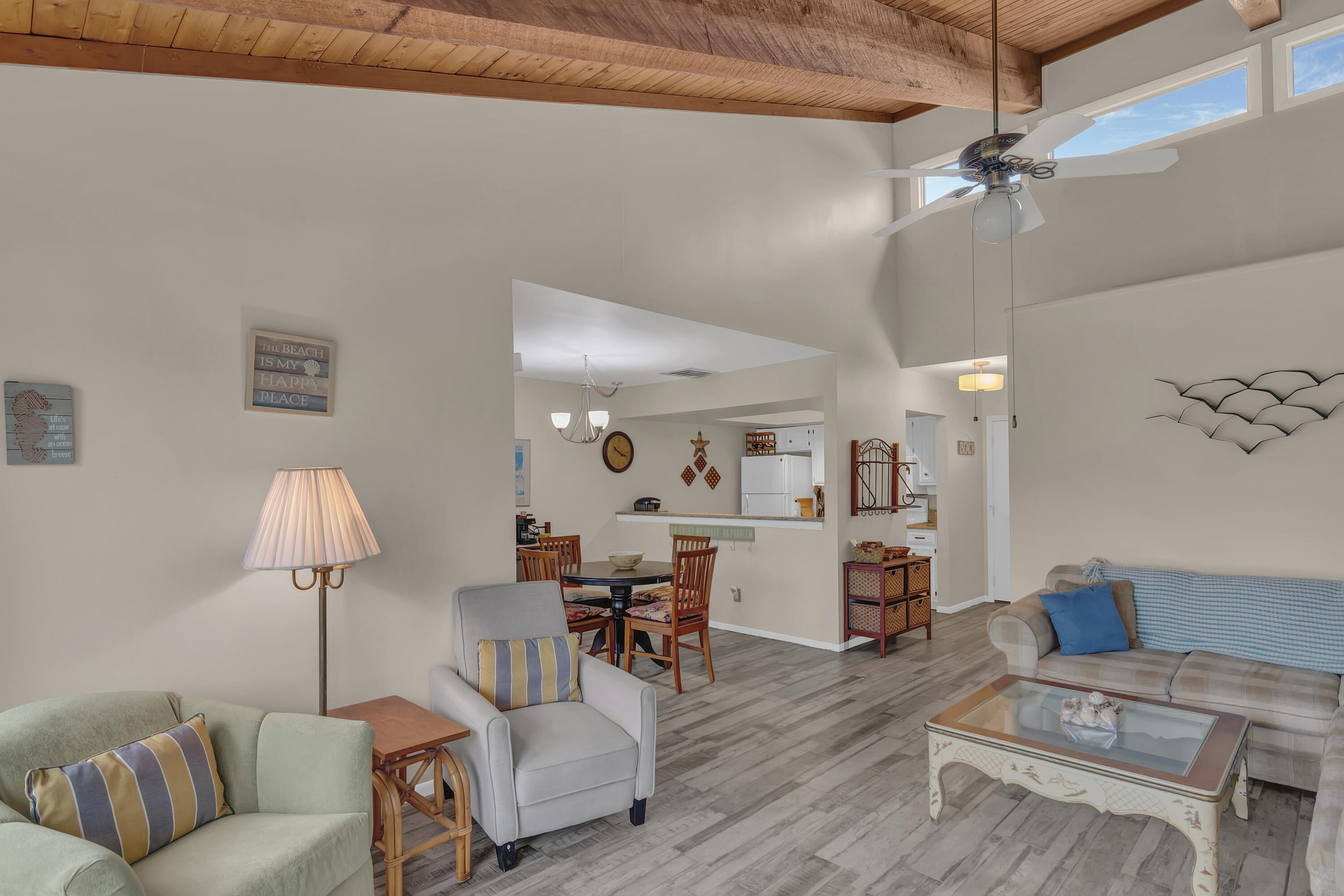 2400 South Ocean Drive, Unit 1122 Fort Pierce, FL 34949 - Photo 4 of 18 a living room with furniture and a table