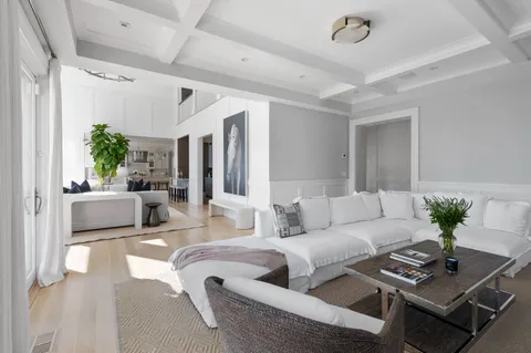 a living room with furniture and a couch