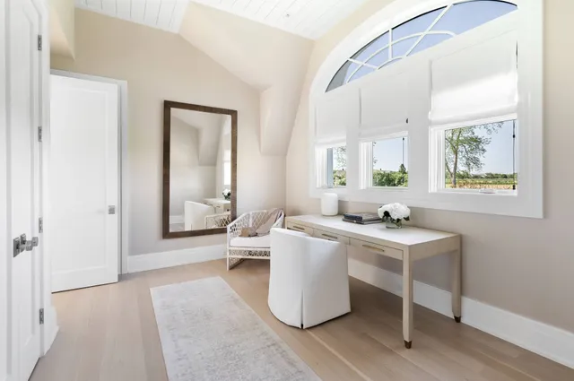 a living room with a couch and a table