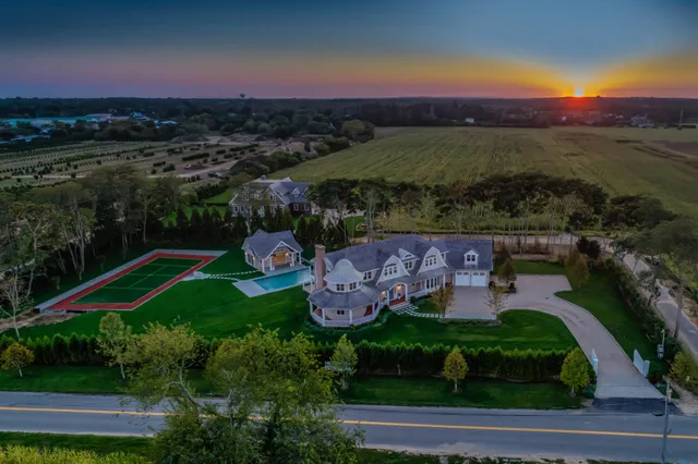 an aerial view of a house with a garden