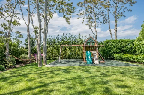 a view of outdoor space with deck and garden