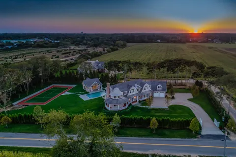 an aerial view of a house with a garden
