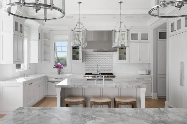 a kitchen with a sink cabinets and window