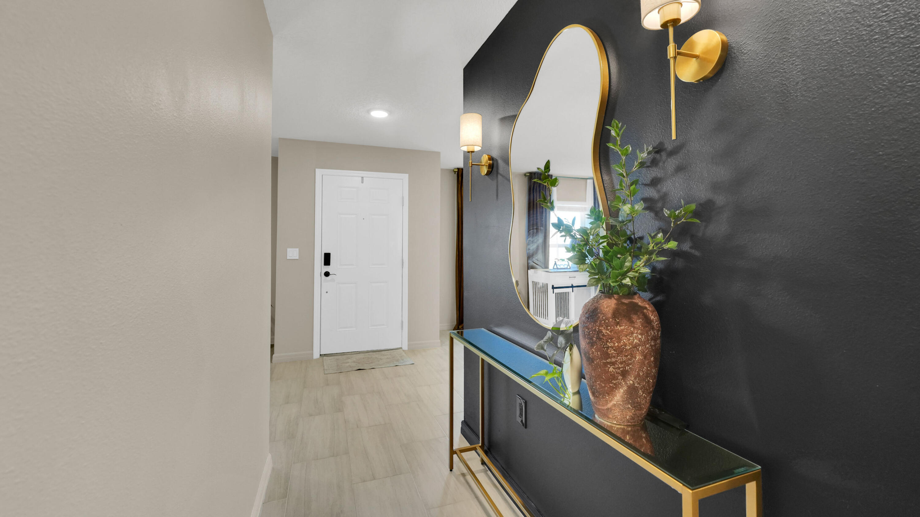 1382 Southwest Becker Road Port St. Lucie, FL 34953 - Photo 12 of 56 a room with painting and potted plant