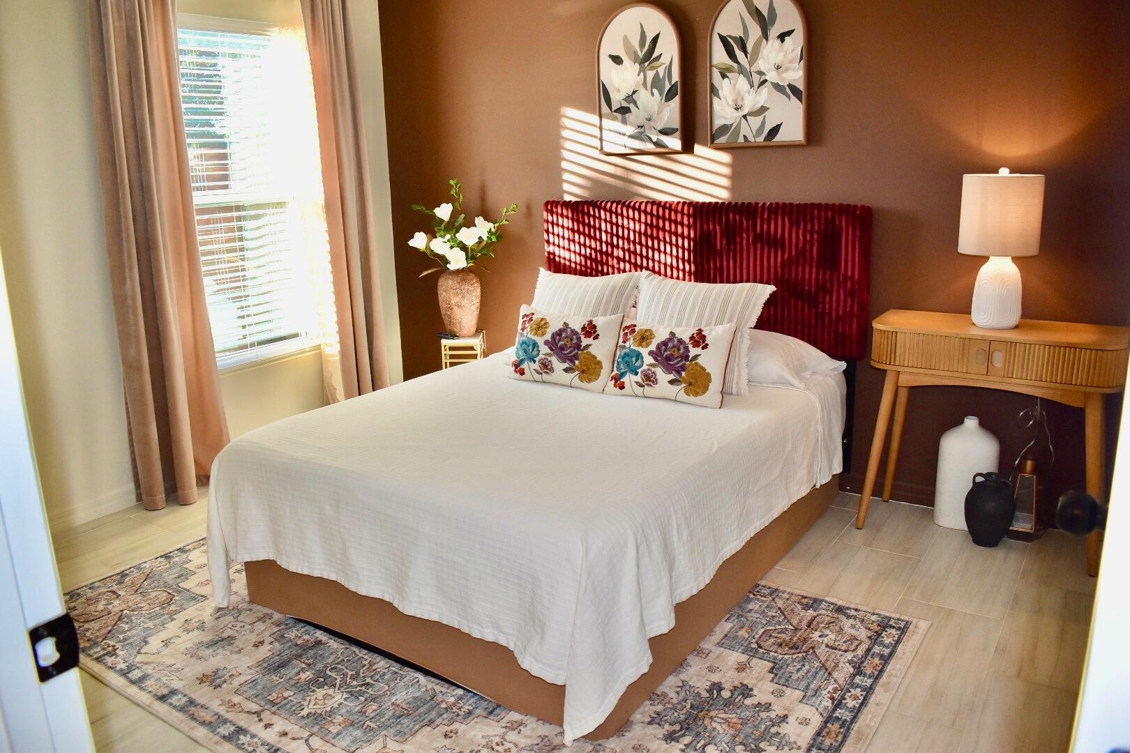 1382 Southwest Becker Road Port St. Lucie, FL 34953 - Photo 35 of 56 a bedroom with a bed and lamp