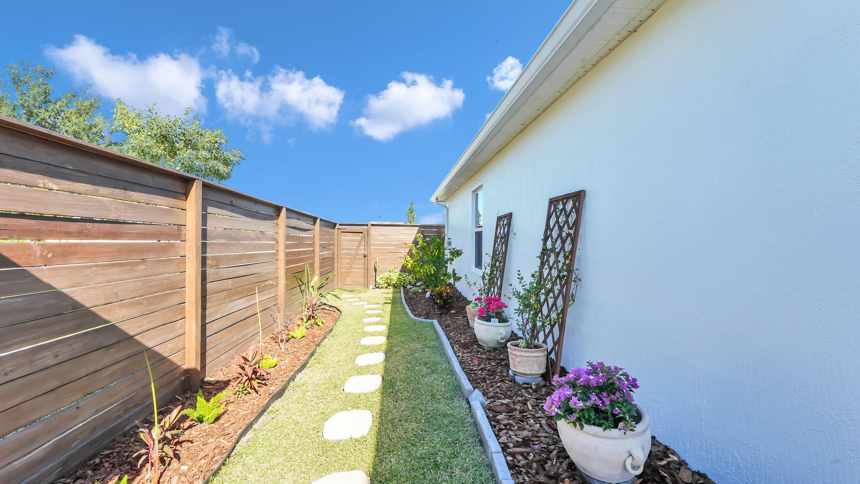 1382 Southwest Becker Road Port St. Lucie, FL 34953 - Photo 42 of 56 side yard