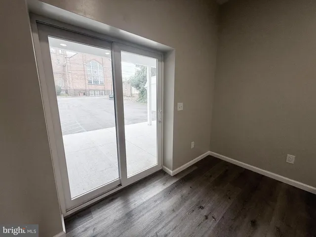 a room with furniture and a flat screen tv