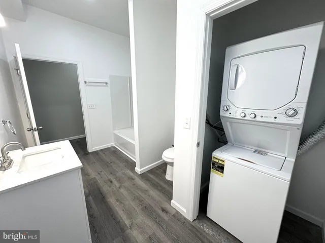 a view of wooden floor in an empty room