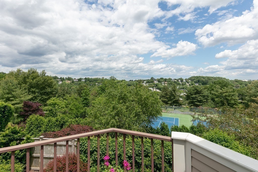 81 Algonquin Road, Unit 81 Newton, MA 02467 - Photo 11 of 40 a balcony with an outdoor space