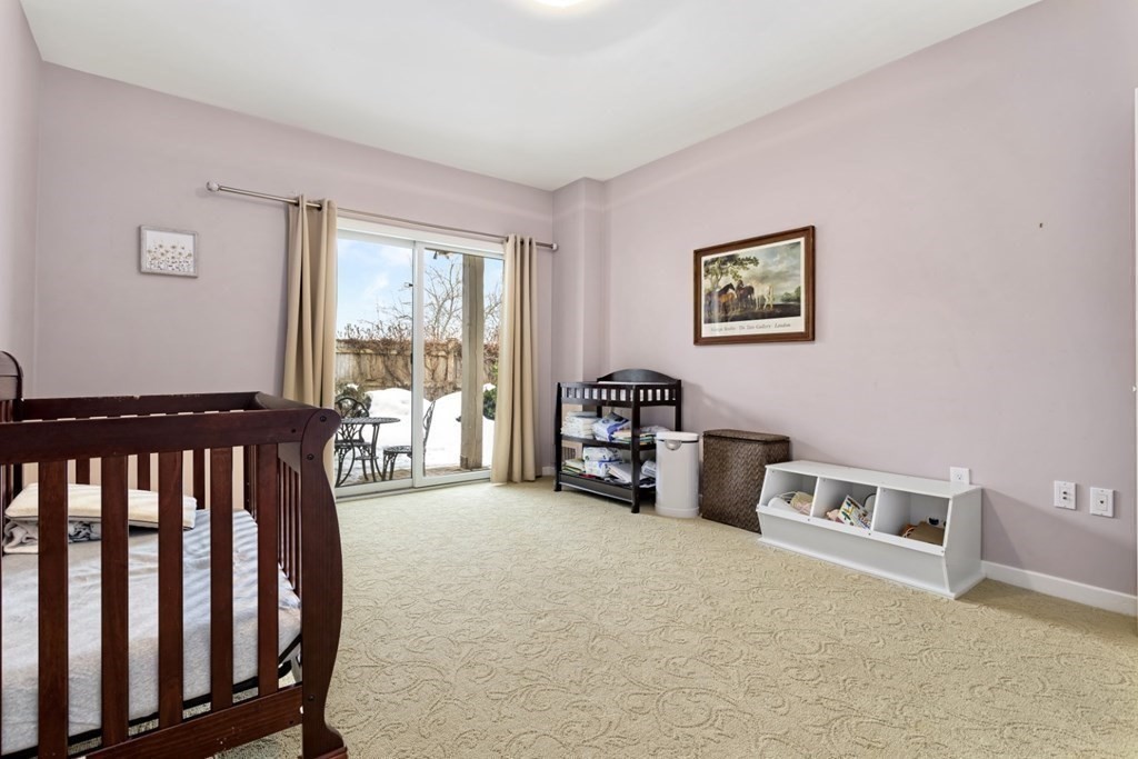 81 Algonquin Road, Unit 81 Newton, MA 02467 - Photo 26 of 40 a view of a livingroom with furniture and workspace