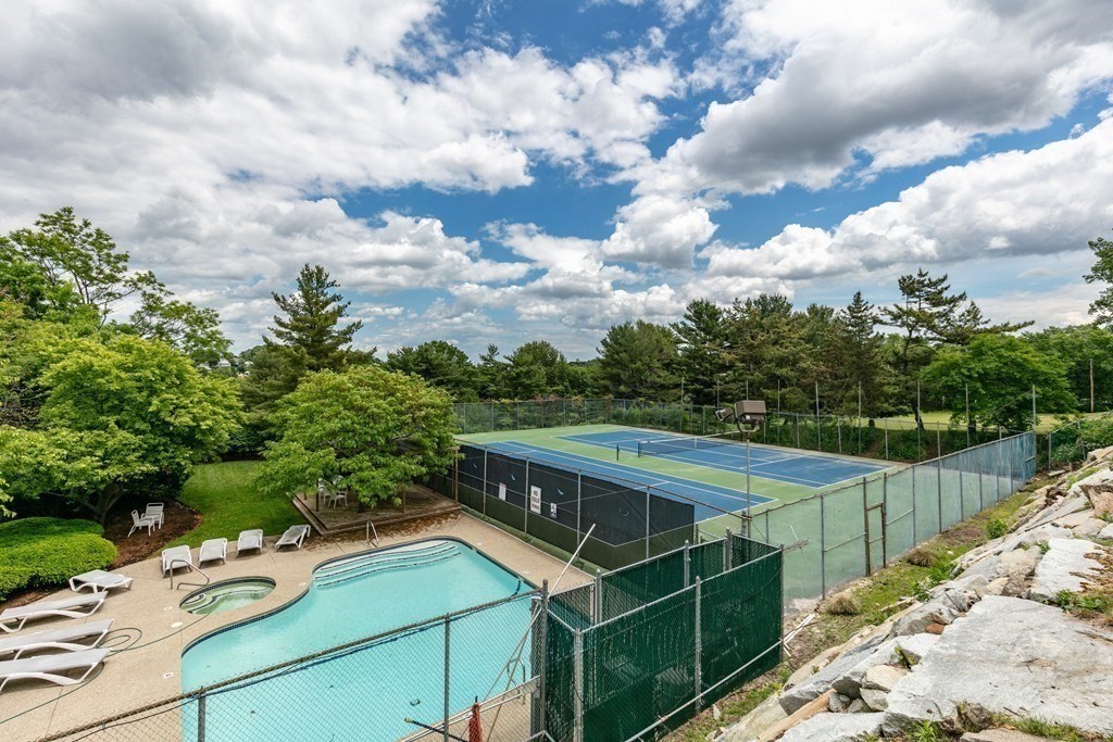 81 Algonquin Road, Unit 81 Newton, MA 02467 - Photo 40 of 40 a view of a backyard with sitting area