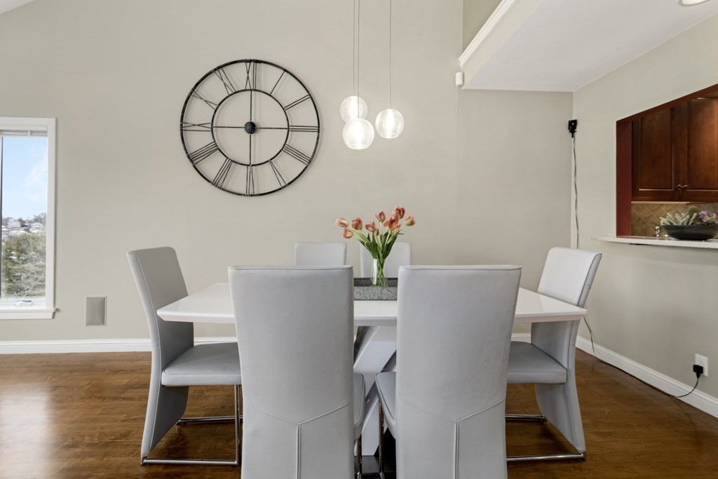81 Algonquin Road, Unit 81 Newton, MA 02467 - Photo 5 of 40 a view of livingroom with furniture and wooden floor