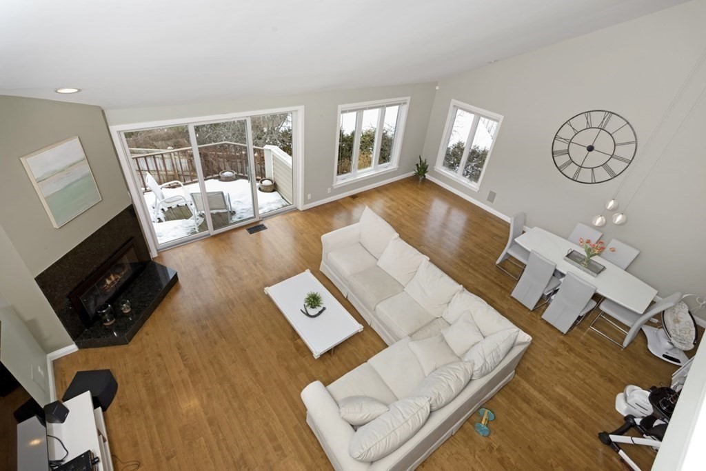 81 Algonquin Road, Unit 81 Newton, MA 02467 - Photo 6 of 40 a living room with furniture and a flat screen tv