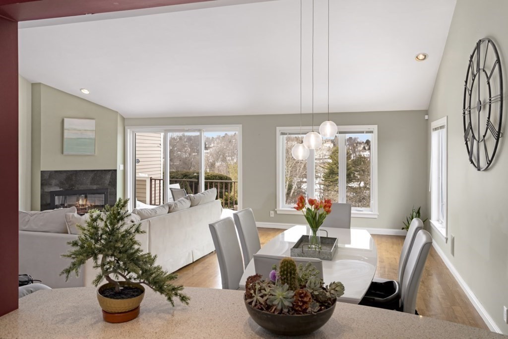 81 Algonquin Road, Unit 81 Newton, MA 02467 - Photo 10 of 40 a view of a dining room with furniture window and outside view