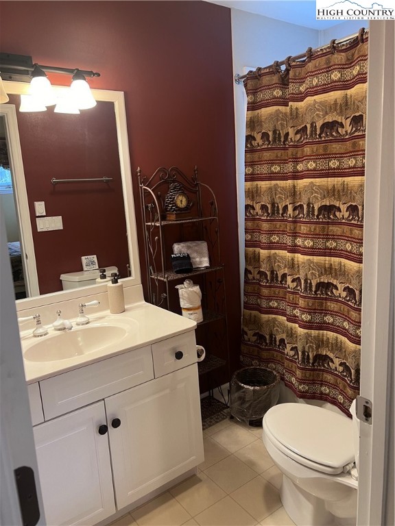 126 Oz Road Beech Mountain, NC 28604 - Photo 20 of 50 a bathroom with a sink a toilet and shower