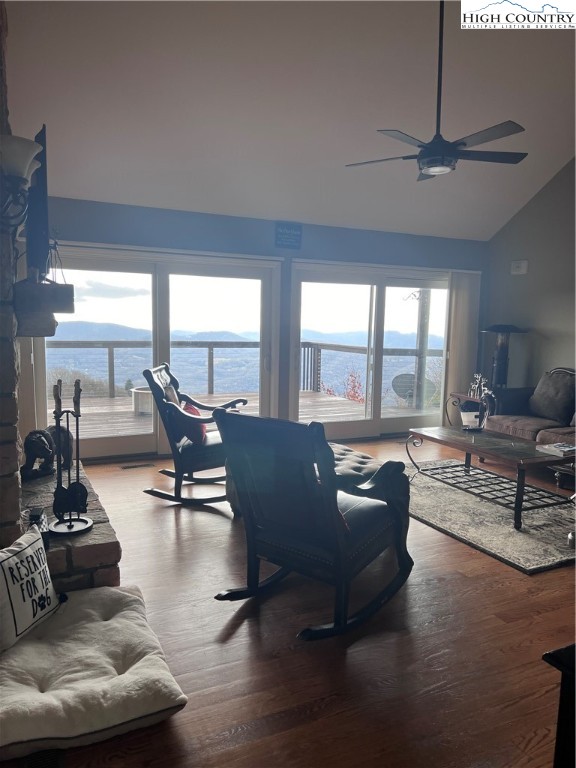 126 Oz Road Beech Mountain, NC 28604 - Photo 22 of 50 a living room with furniture and floor to ceiling windows