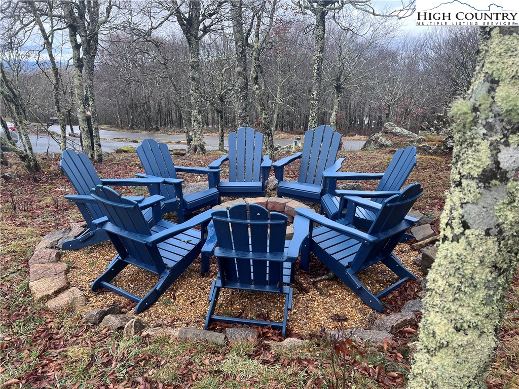 126 Oz Road Beech Mountain, NC 28604 - Photo 30 of 50 a view of a dinning table and chairs in the yard