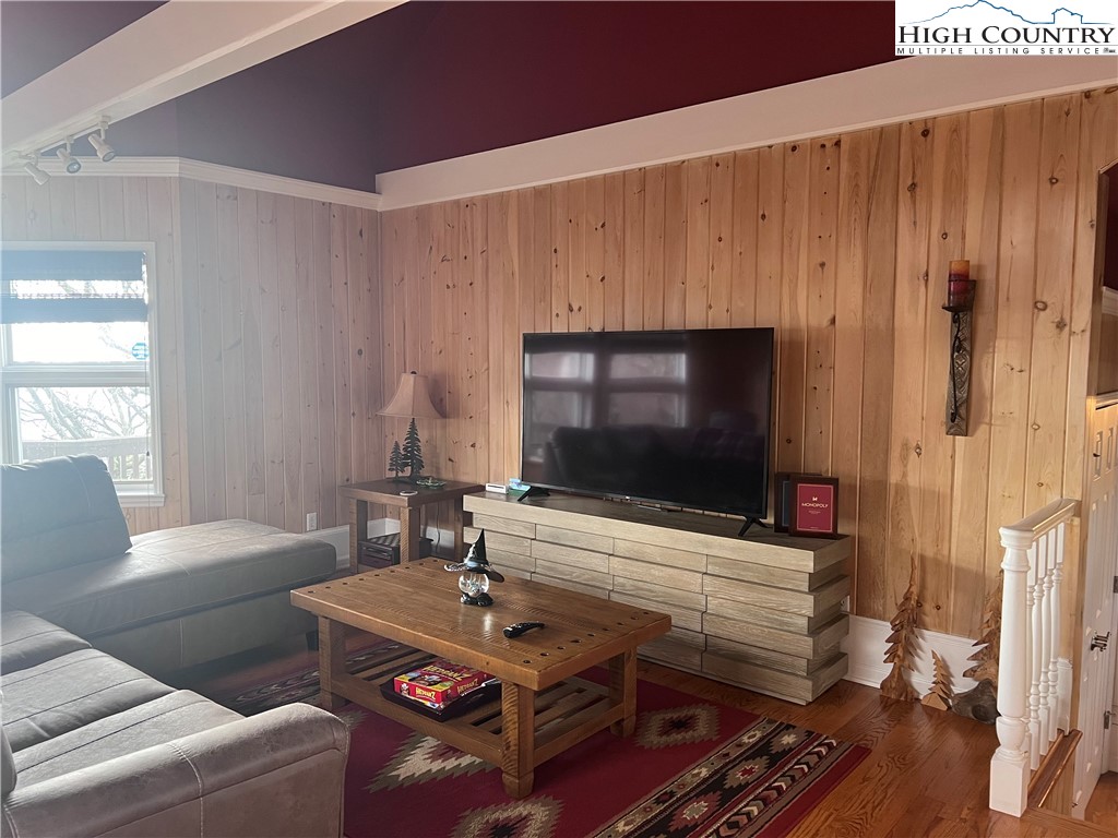 126 Oz Road Beech Mountain, NC 28604 - Photo 46 of 50 a living room with furniture and a flat screen tv