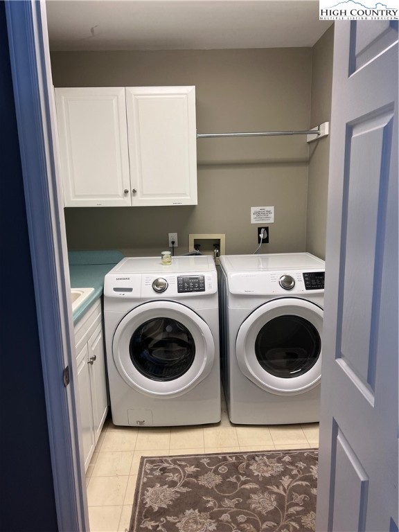 126 Oz Road Beech Mountain, NC 28604 - Photo 47 of 50 a utility room with dryer and washer