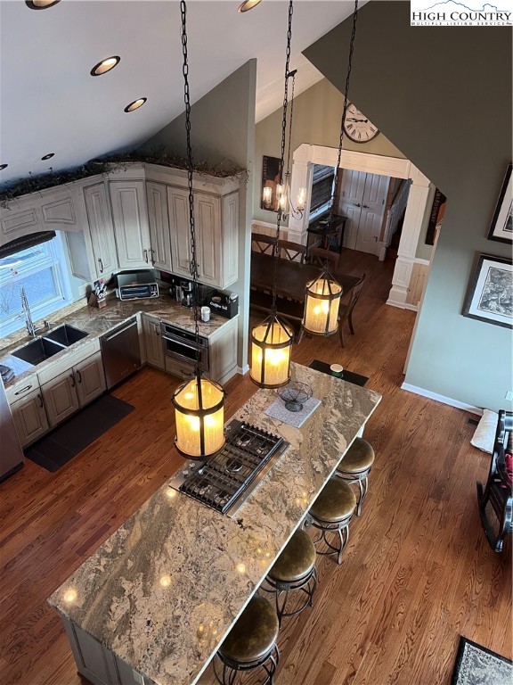 126 Oz Road Beech Mountain, NC 28604 - Photo 5 of 50 a kitchen with kitchen island a stove and a wooden floor