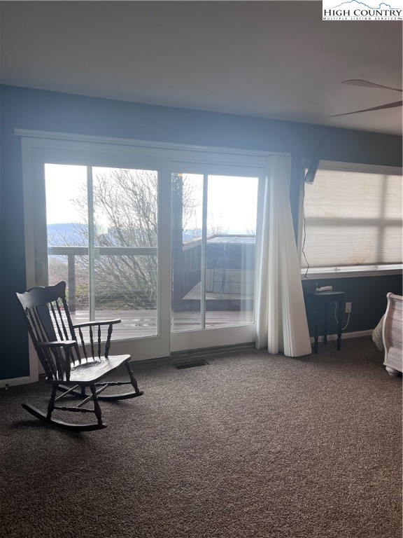 126 Oz Road Beech Mountain, NC 28604 - Photo 10 of 50 a living room with furniture and a large window