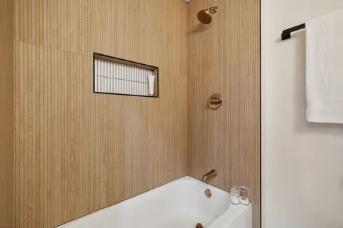 a bathroom with a bathtub