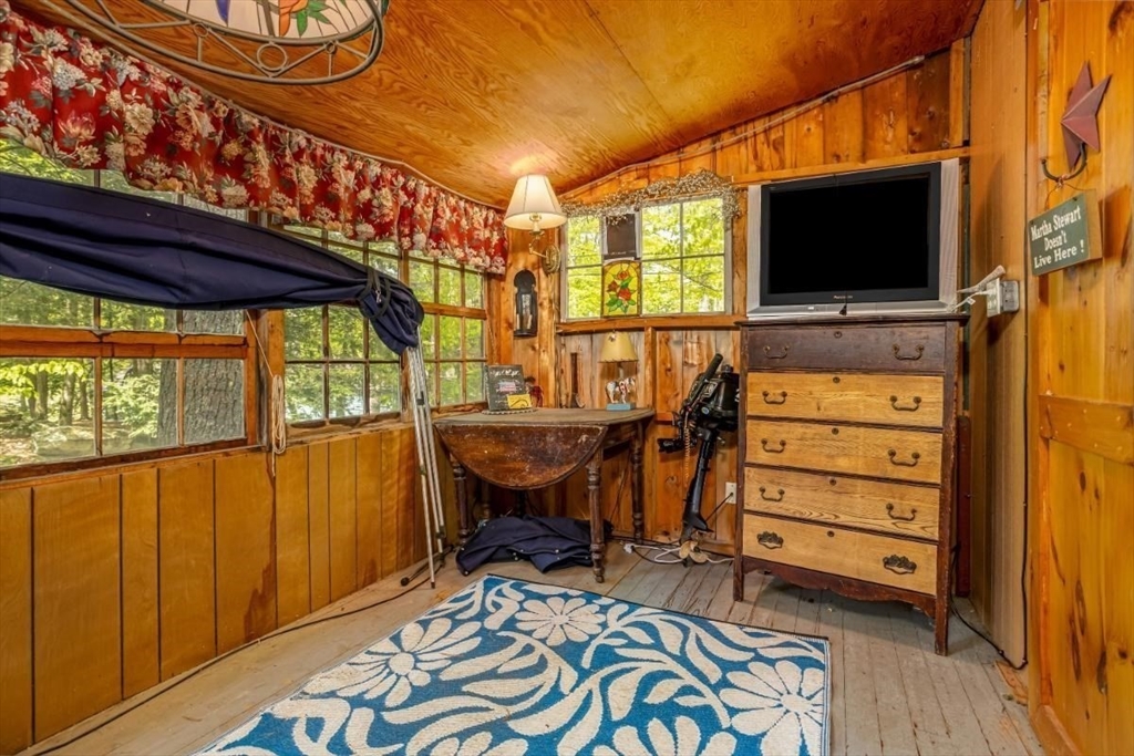 12 King Road Phillipston, MA 01331 - Photo 22 of 41 a room with furniture and flat screen tv