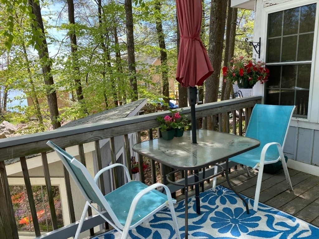 12 King Road Phillipston, MA 01331 - Photo 32 of 41 a balcony view with couple of chairs and wooden floor