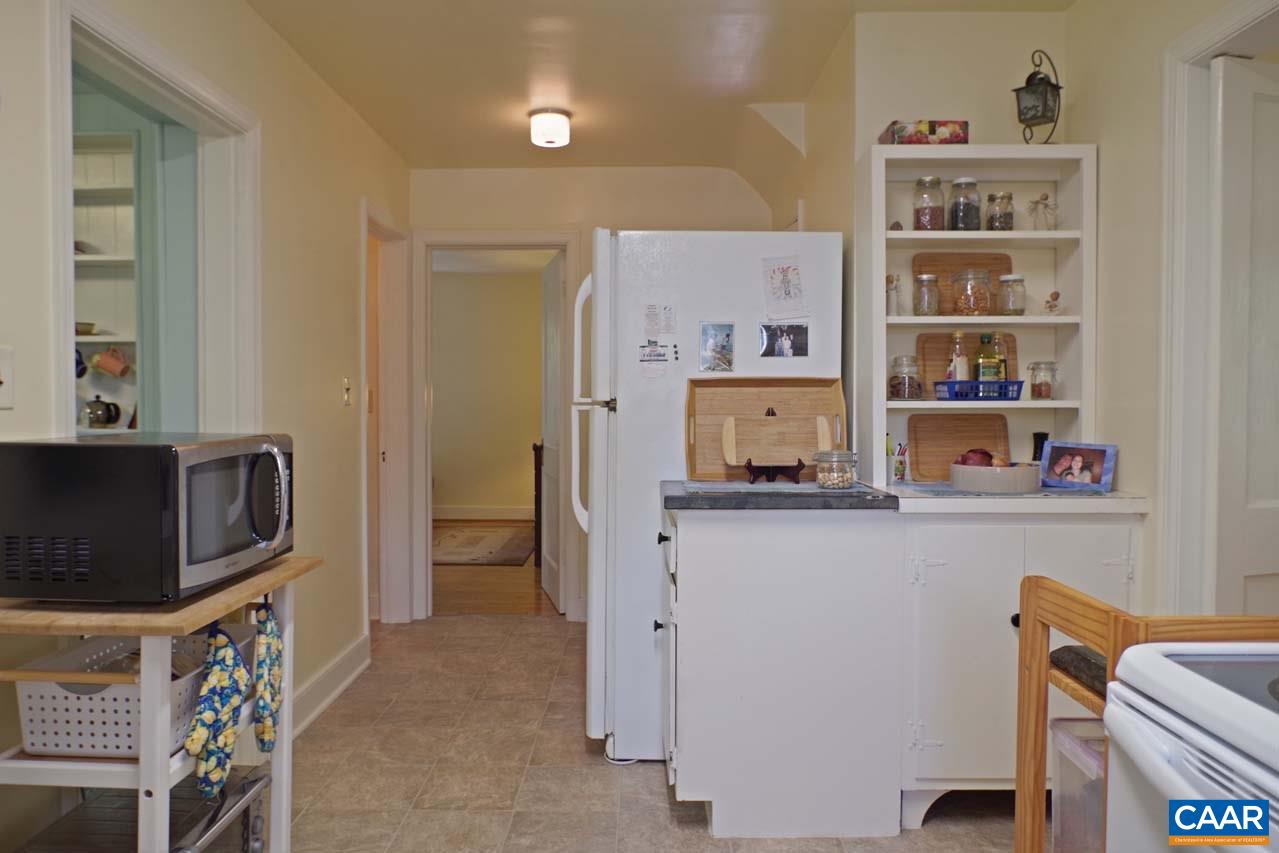 88 Court Street Lovingston, VA 22949 - Photo 15 of 44 a room with cabinets and a wooden floor