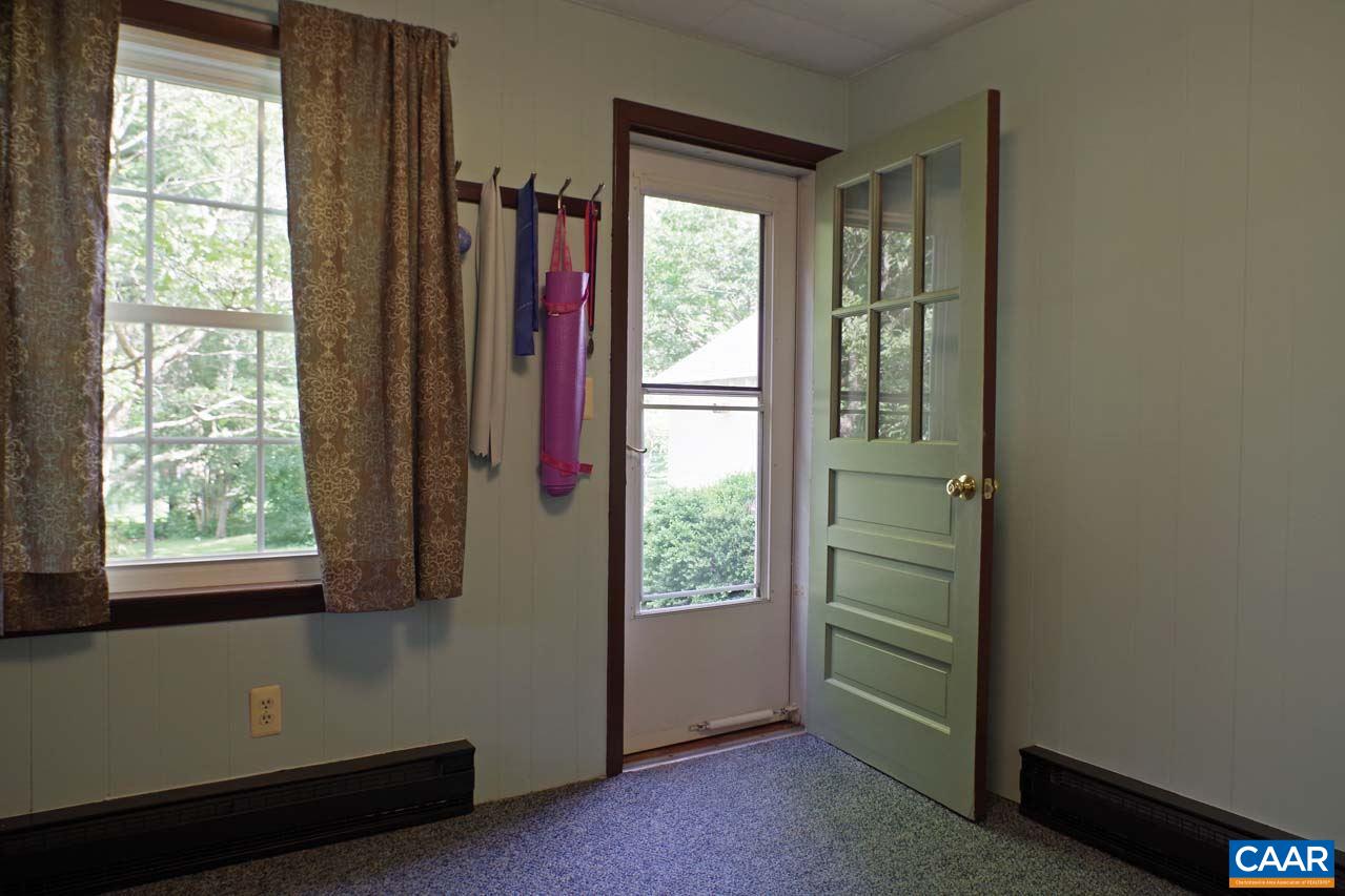 88 Court Street Lovingston, VA 22949 - Photo 20 of 44 a view of a room with a large window