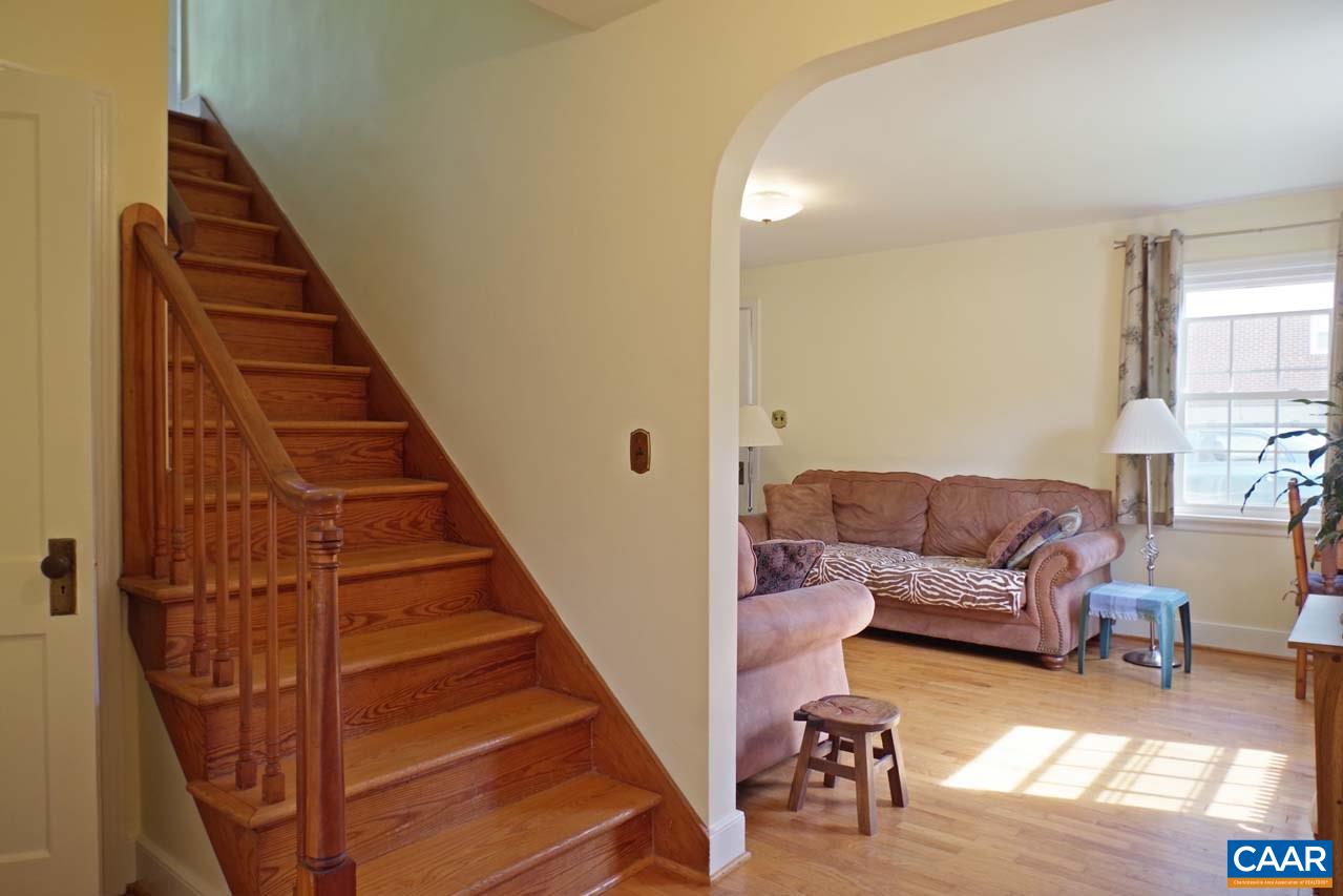 88 Court Street Lovingston, VA 22949 - Photo 26 of 44 a living room with furniture and a stair