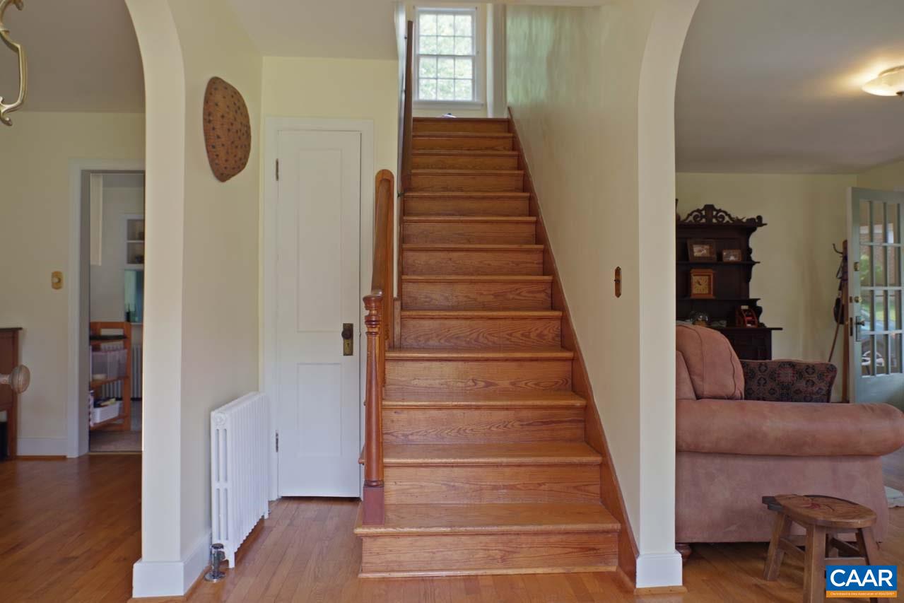88 Court Street Lovingston, VA 22949 - Photo 3 of 44 a view of entryway and hall with wooden floor