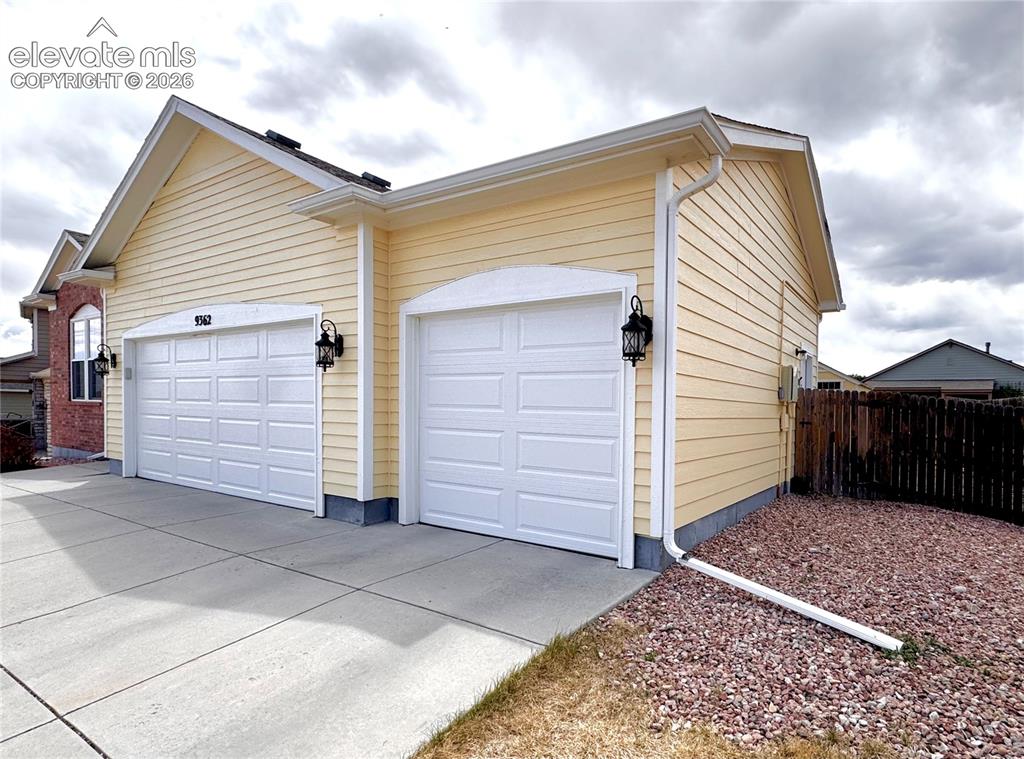 9362 St.George Road Peyton, CO 80831 - Photo 31 of 32 a view of a house with a garage
