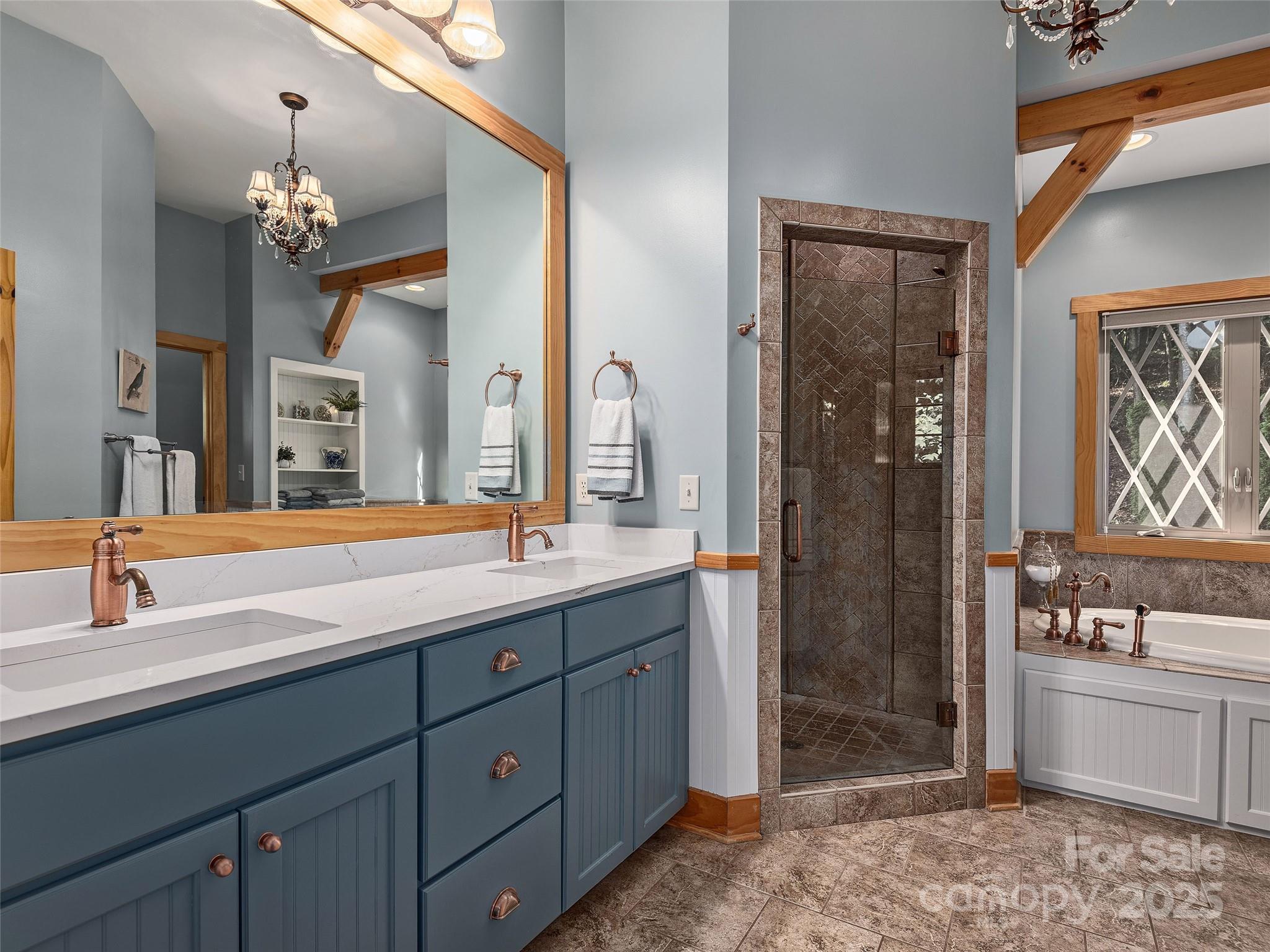 92 Island View Court Mill Spring, NC 28756 - Photo 18 of 48 a bathroom with a double vanity sink mirror and double