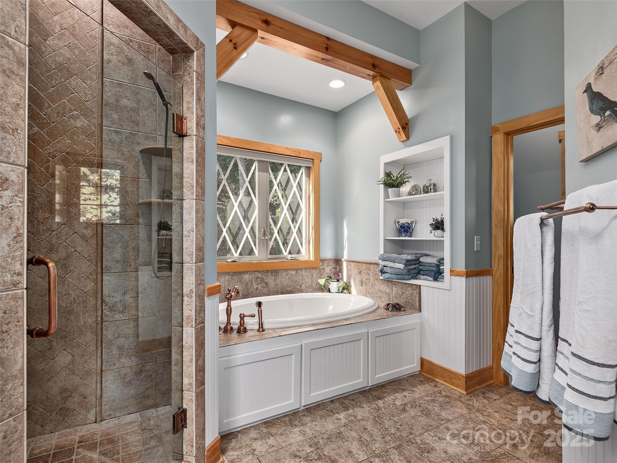92 Island View Court Mill Spring, NC 28756 - Photo 19 of 48 a bathroom with a sink a toilet and shower