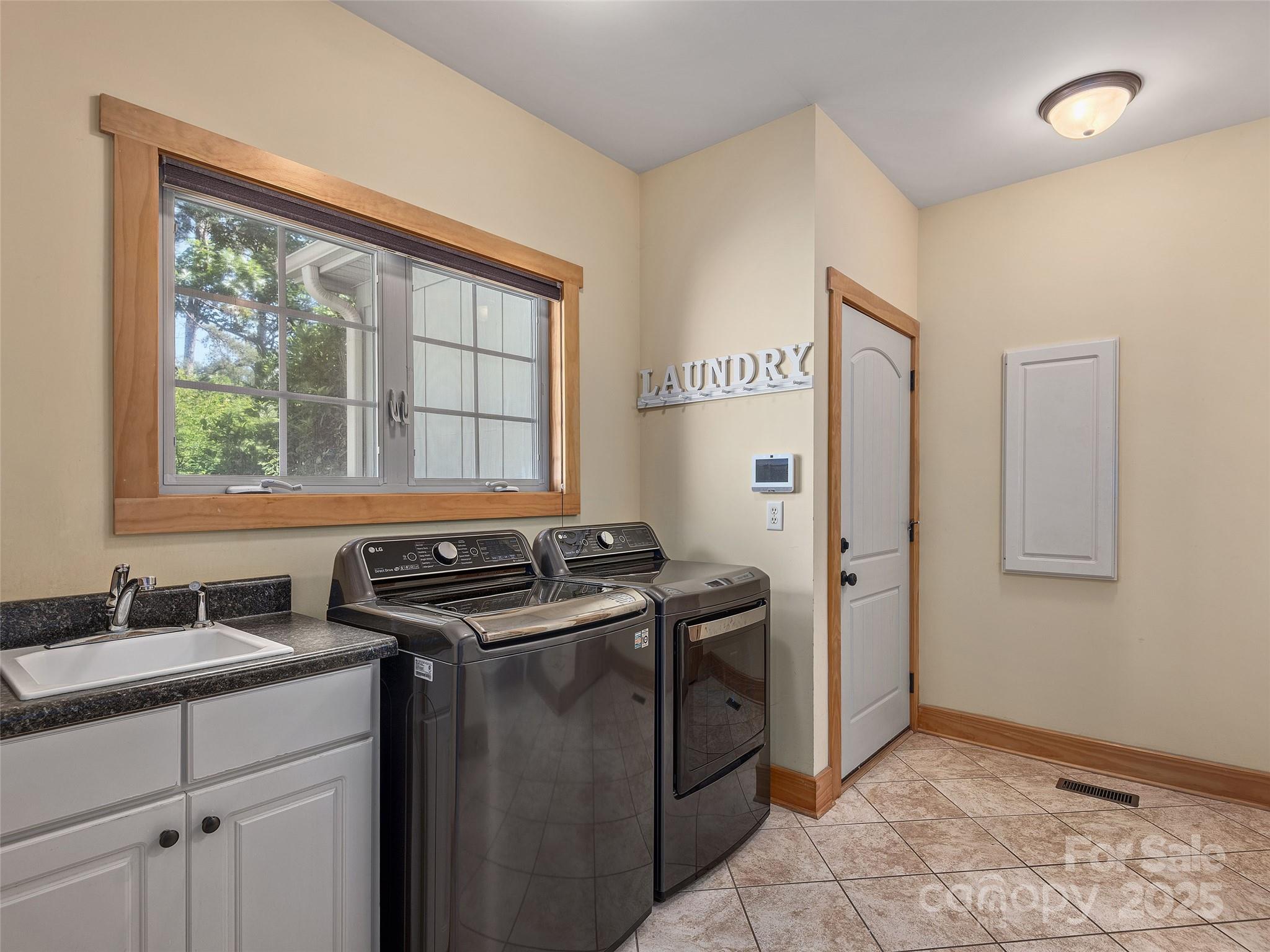 92 Island View Court Mill Spring, NC 28756 - Photo 26 of 48 a kitchen with stainless steel appliances granite countertop a sink stove and refrigerator