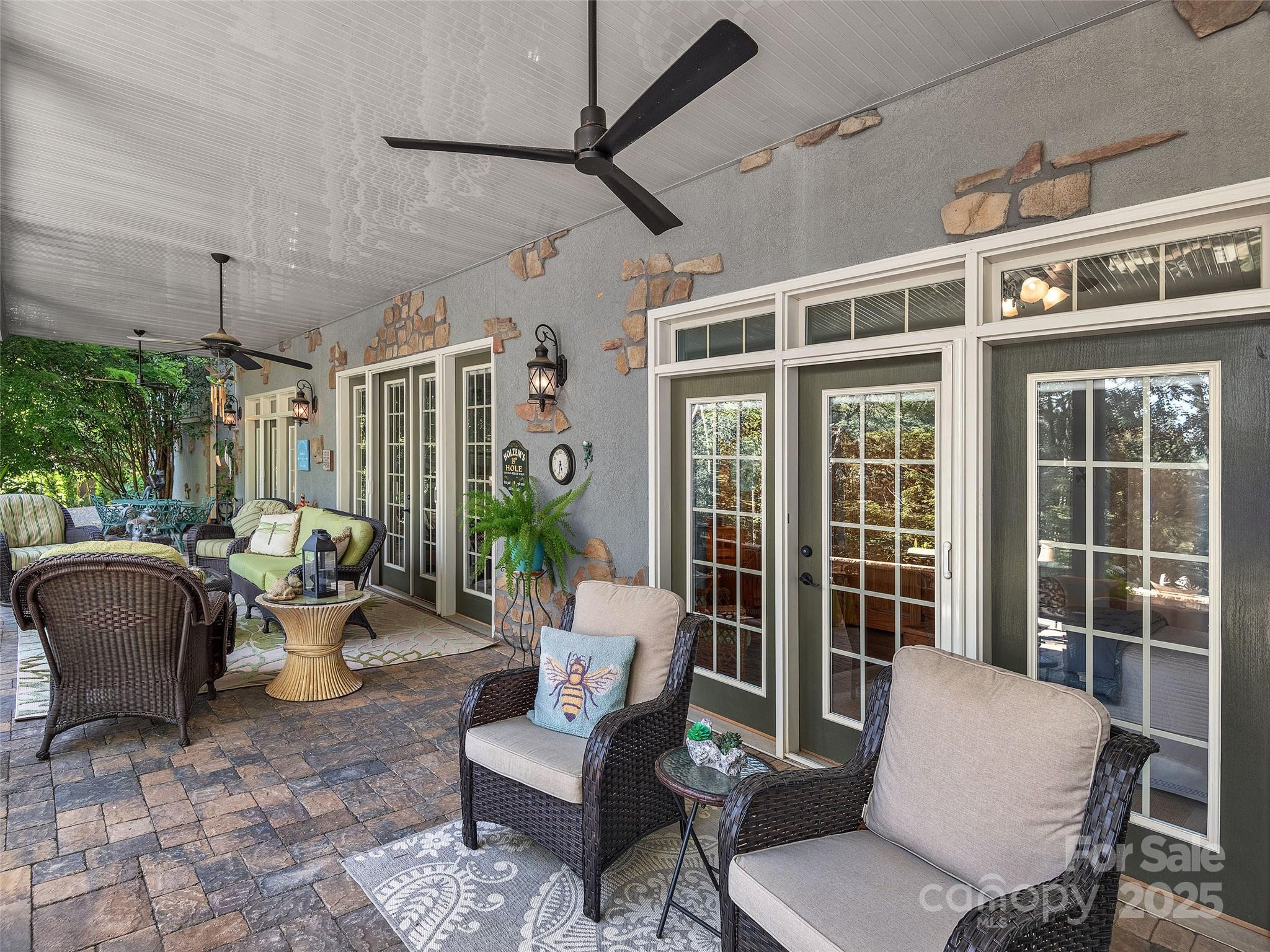 92 Island View Court Mill Spring, NC 28756 - Photo 28 of 48 a balcony with furniture and a potted plant