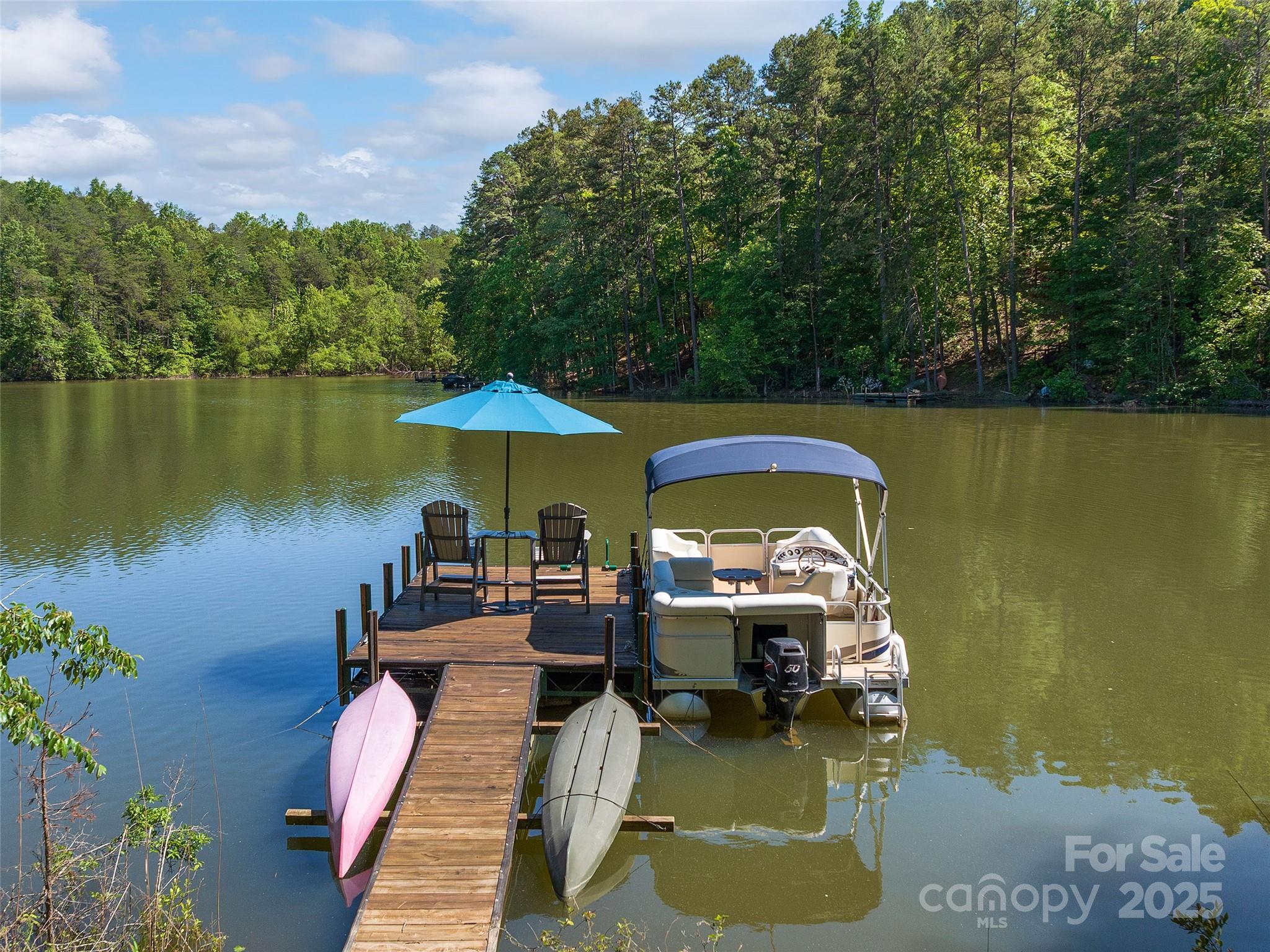 92 Island View Court Mill Spring, NC 28756 - Photo 37 of 48 swimming pool view with a seating space