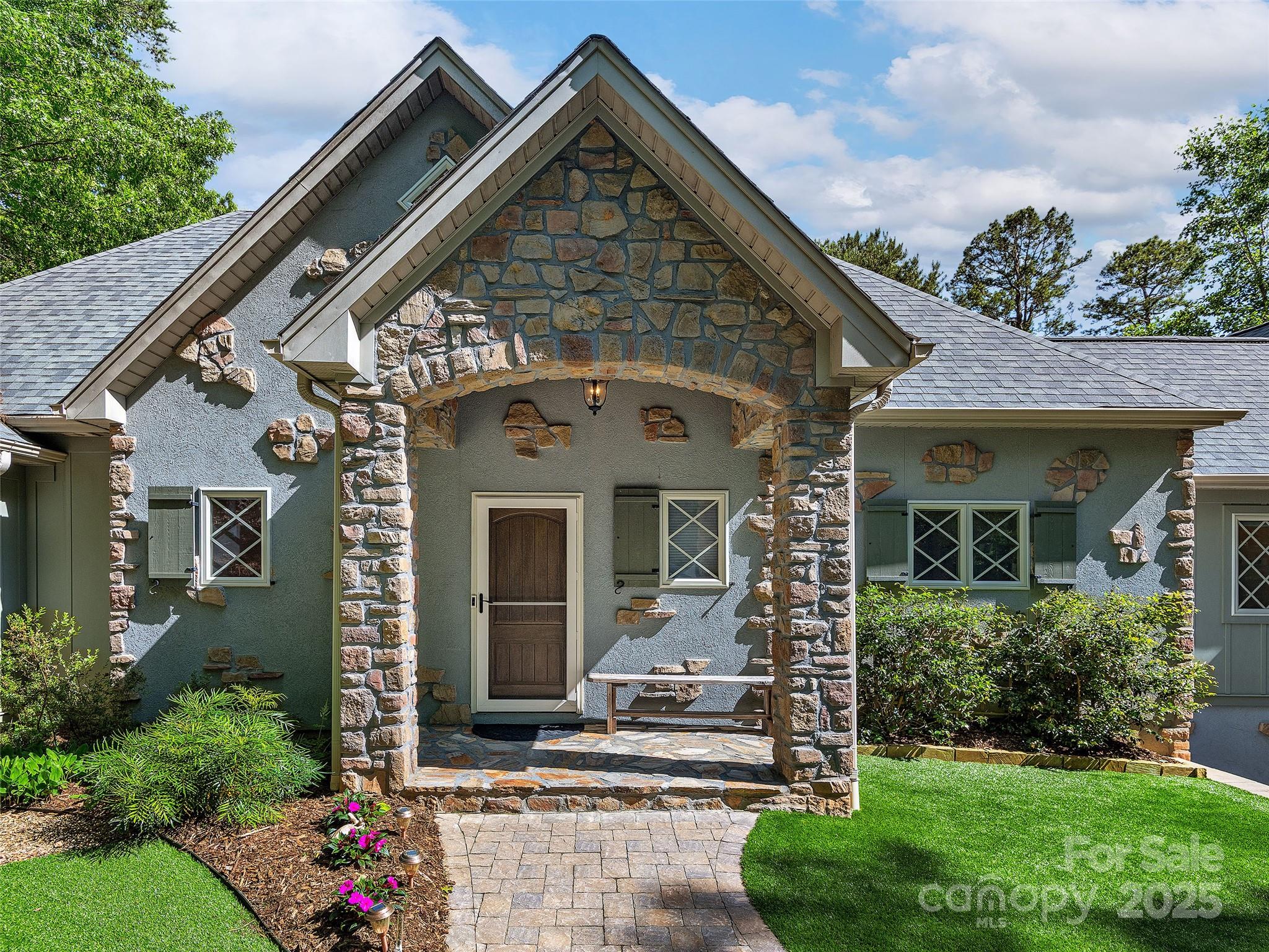 92 Island View Court Mill Spring, NC 28756 - Photo 4 of 48 a front view of a house with a porch
