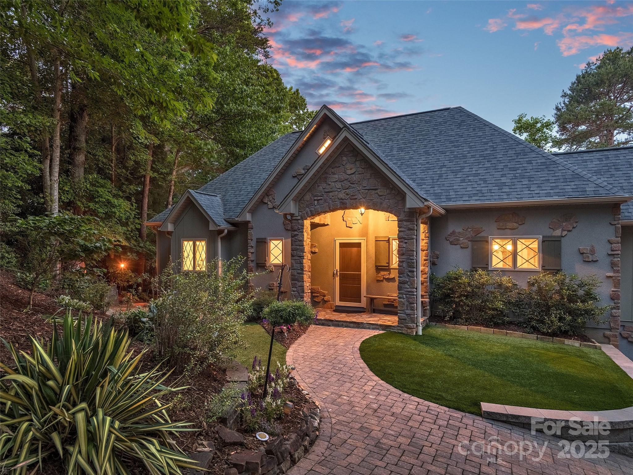 92 Island View Court Mill Spring, NC 28756 - Photo 43 of 48 a front view of a house with a yard