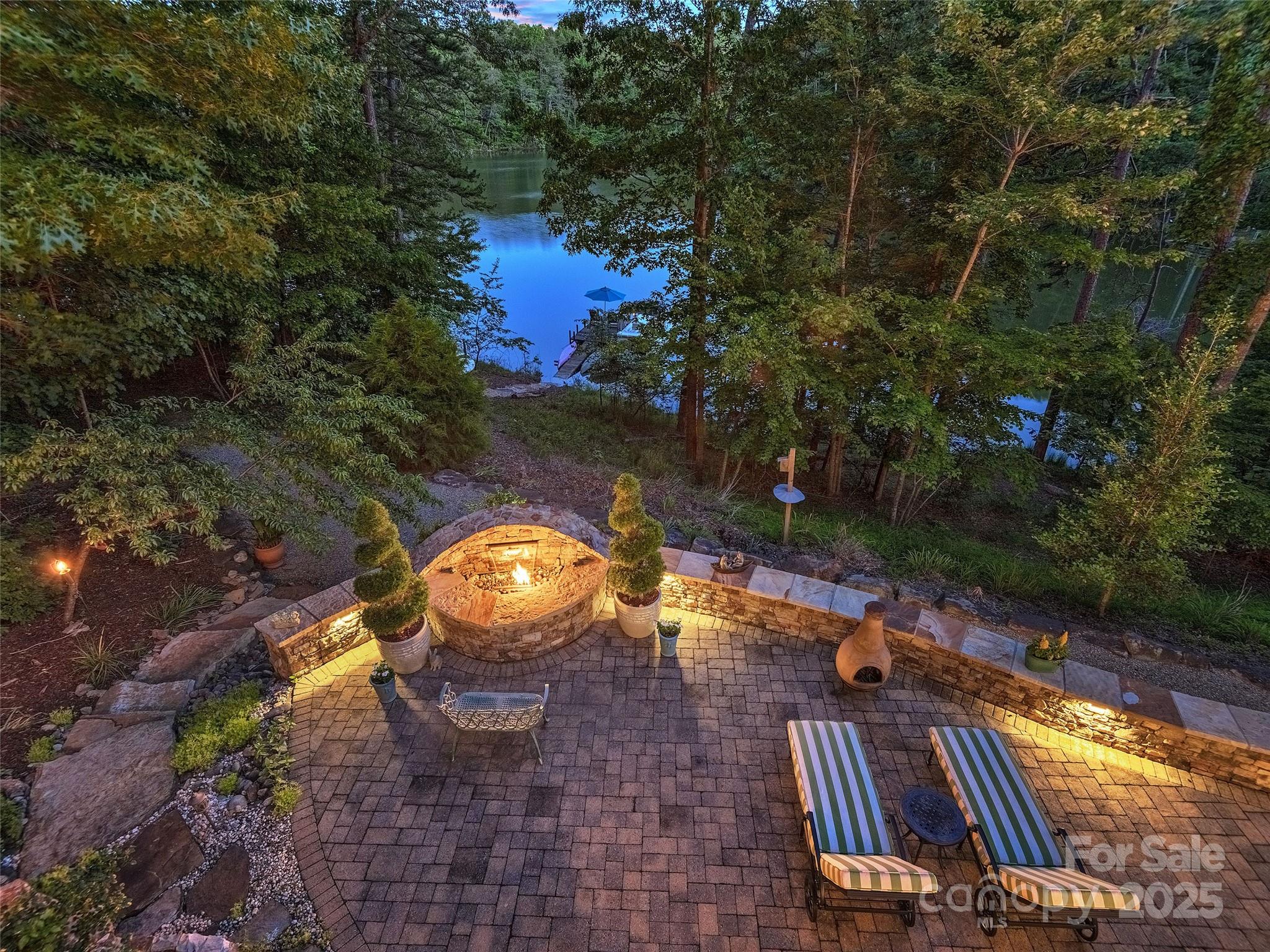 92 Island View Court Mill Spring, NC 28756 - Photo 44 of 48 a view of swimming pool with sitting area and garden
