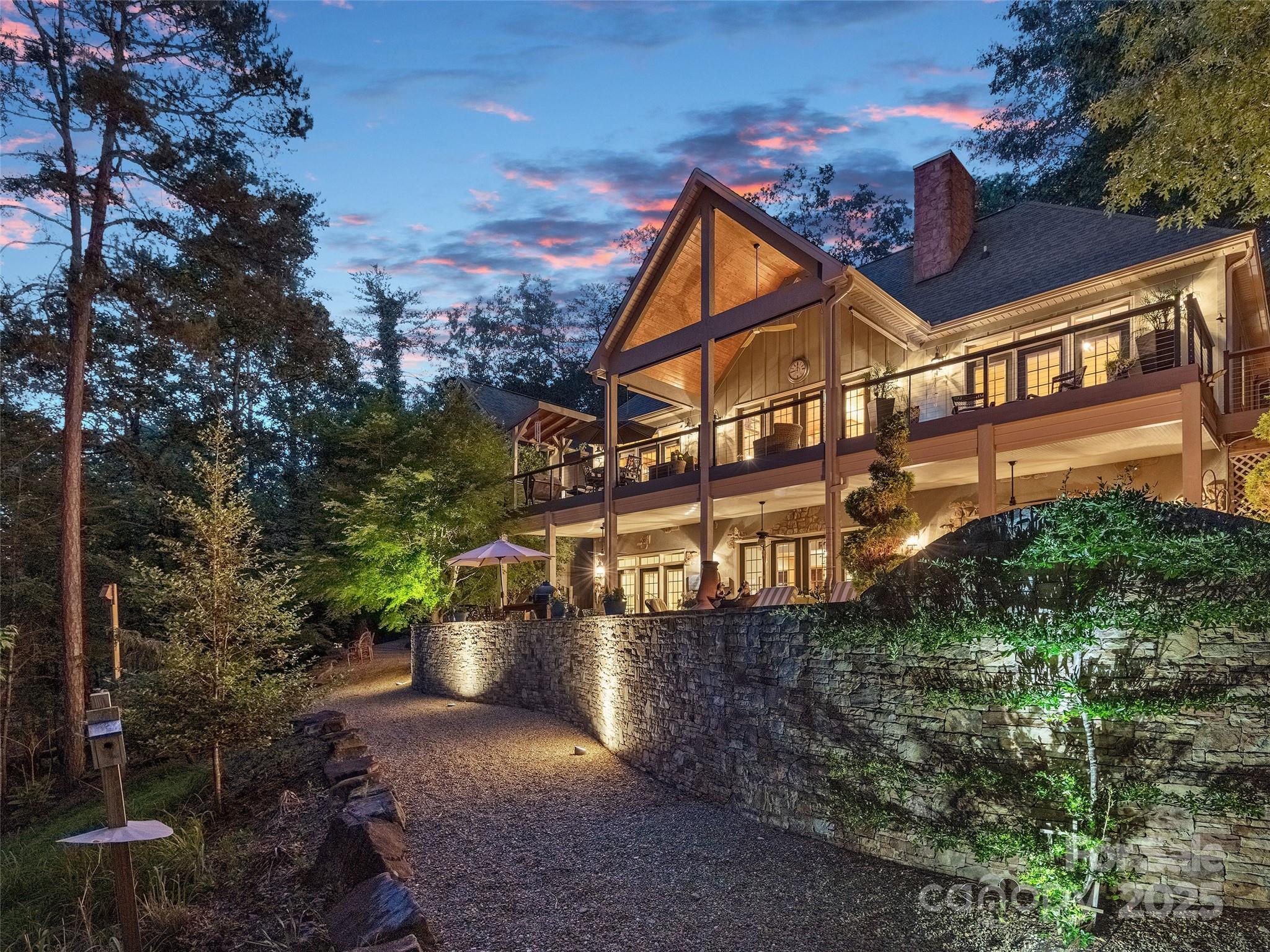 92 Island View Court Mill Spring, NC 28756 - Photo 48 of 48 a view of a street with potted plants and large tree