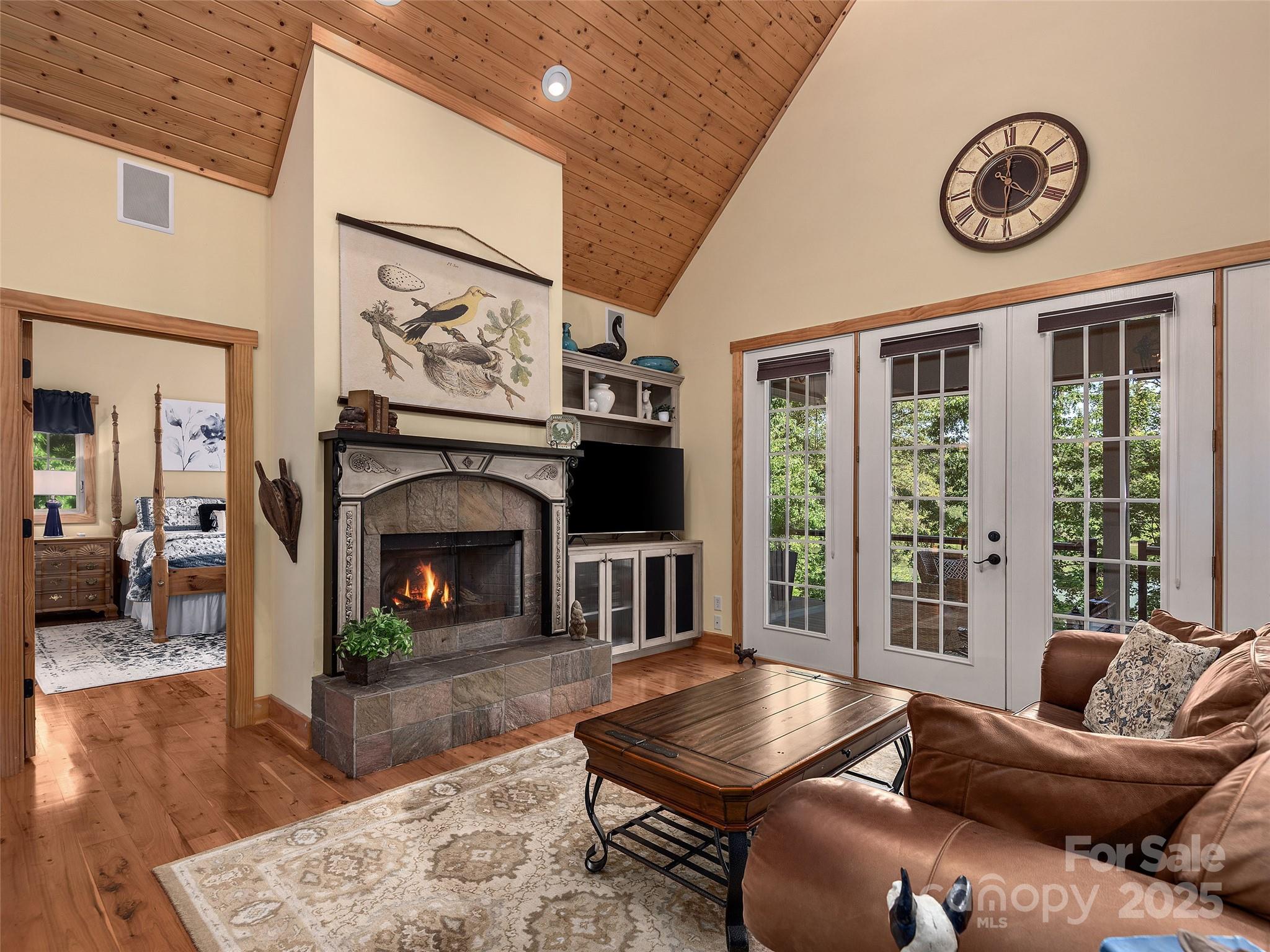 92 Island View Court Mill Spring, NC 28756 - Photo 5 of 48 a living room with furniture and a fireplace