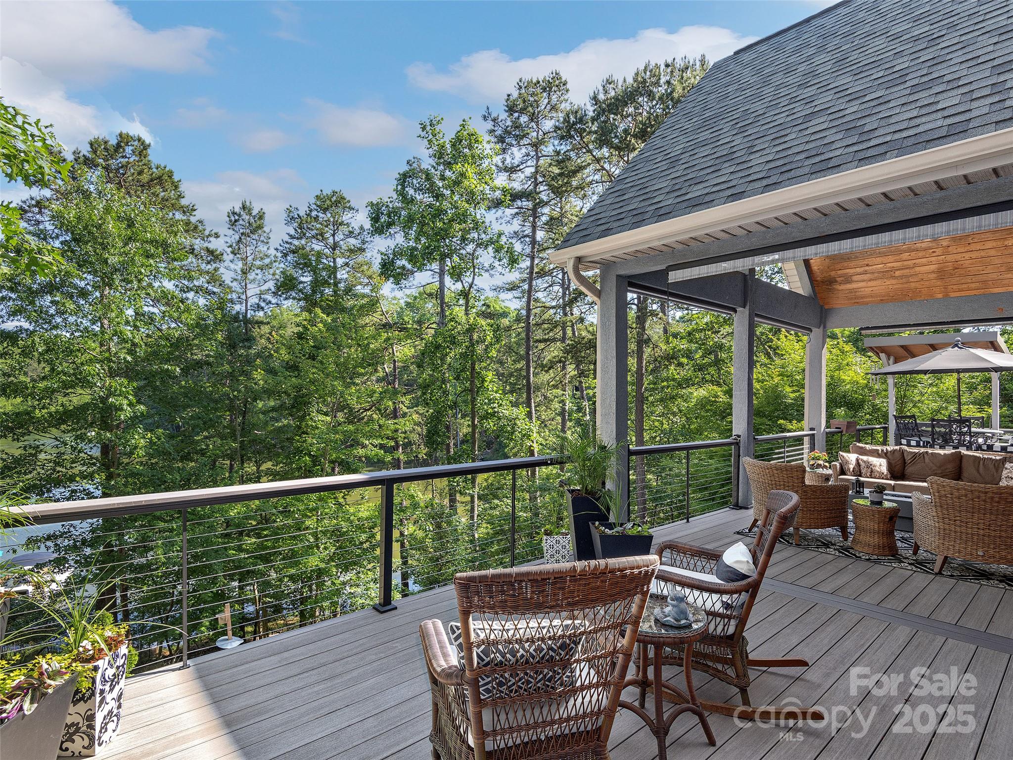 92 Island View Court Mill Spring, NC 28756 - Photo 10 of 48 a view of a chair and table in the balcony