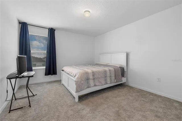 a view of a hallway with closet area